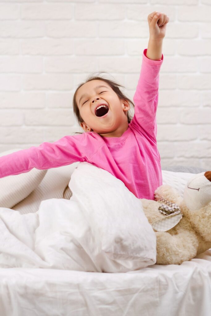 a kid waking up from sleep