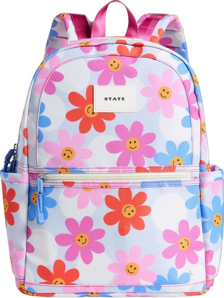a flowered backpack as a nice design to consider when choosing the right backpack for your kid