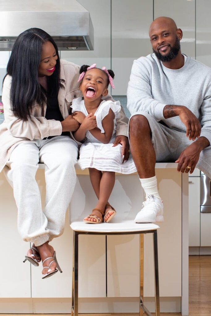picture of a kid and her parents