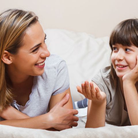 kid giving her mom a gist