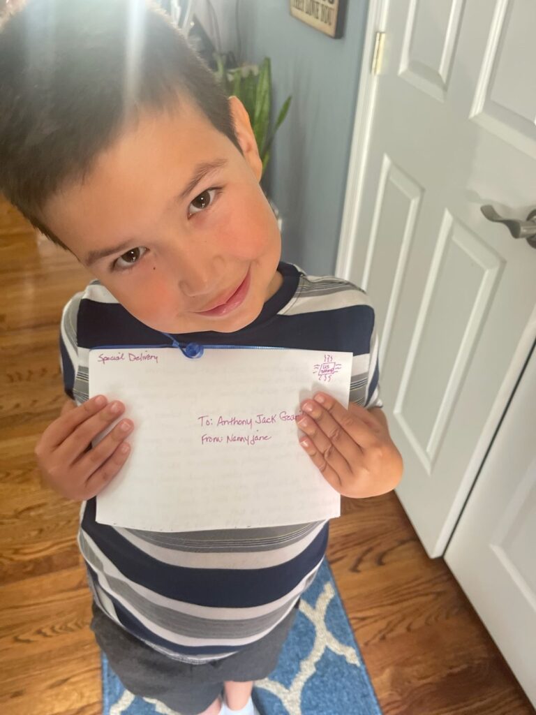 kid with a written note