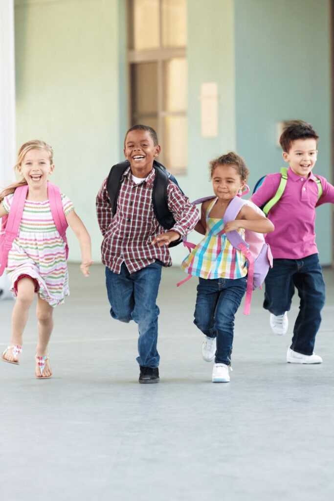 kids running back from school