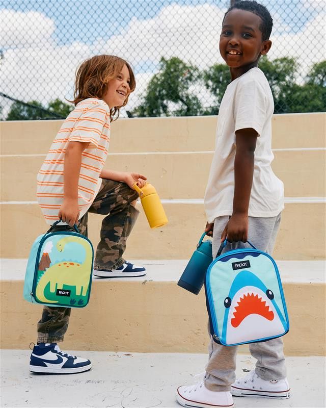 kids taking picture with their lunch box