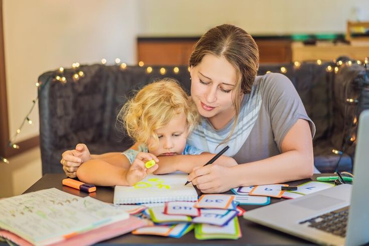 mom and daughter doing homework