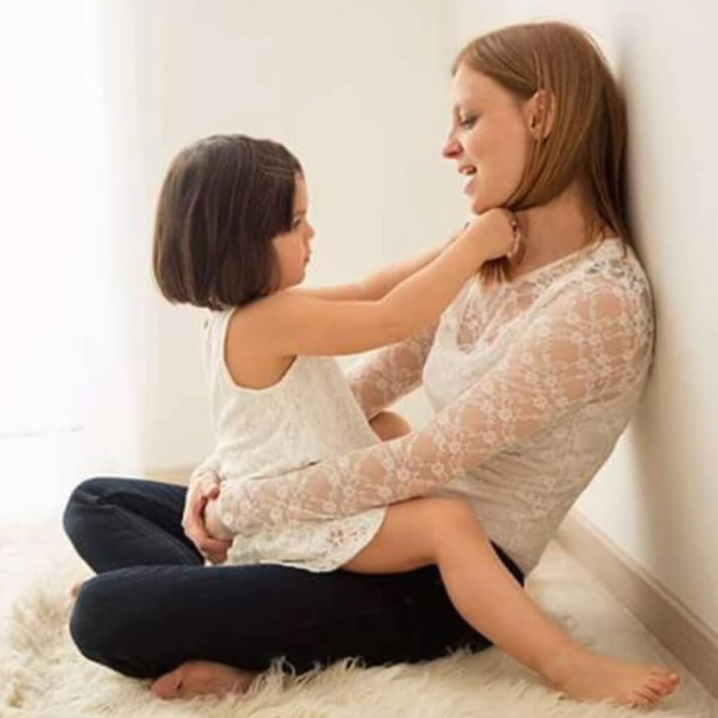 mom and daughter sitting together