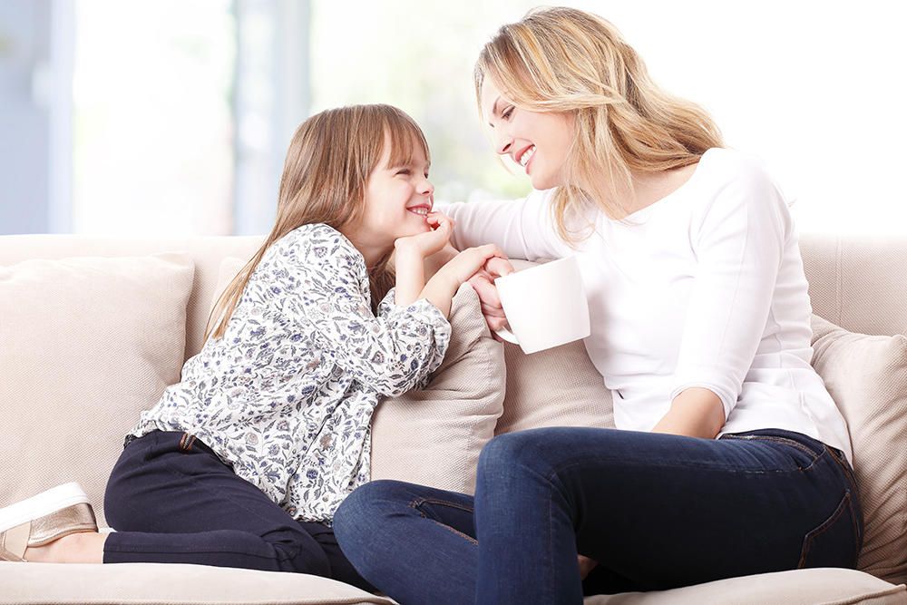 mom and kid chatting and having a good time together