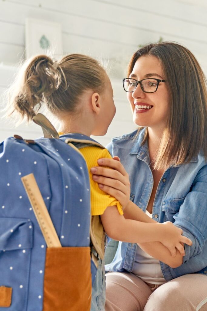 mom and kid having a little chat before school time