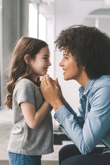 a mother having a fun time with her child