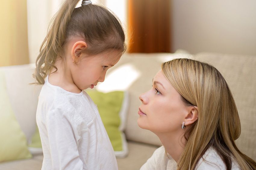 mom trying to have a conversation with her kid