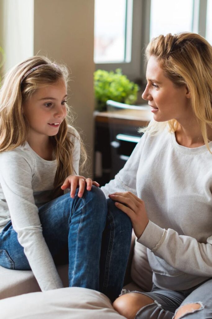 a mother asking her child questions as a way to get her child ready for the first day of school