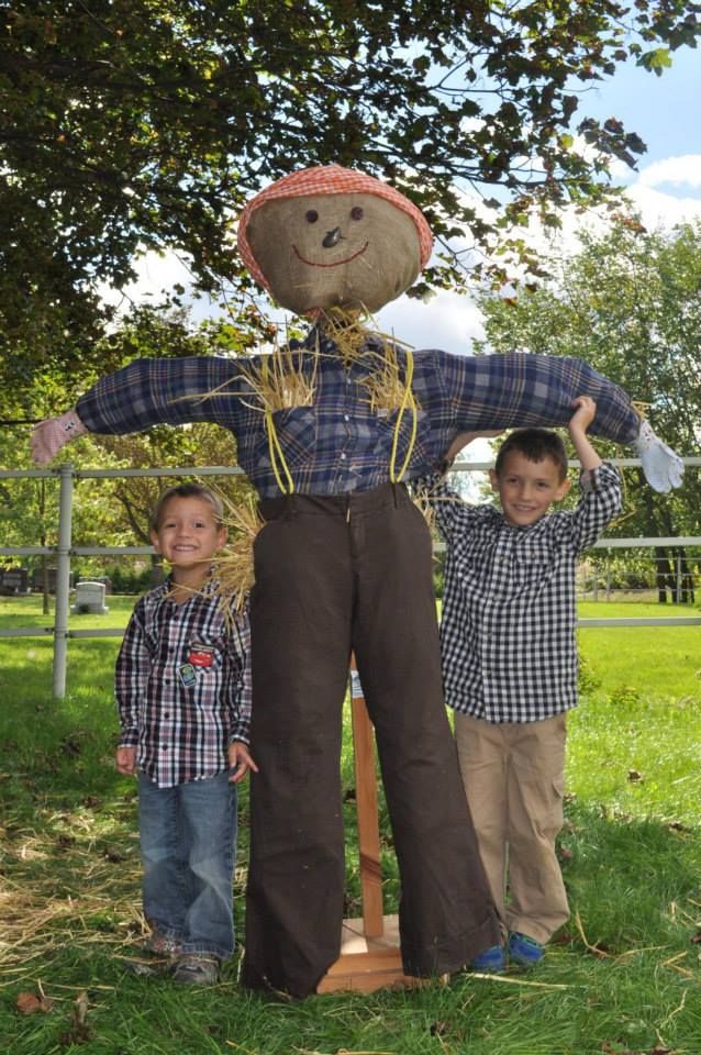 kids with a scarecrow