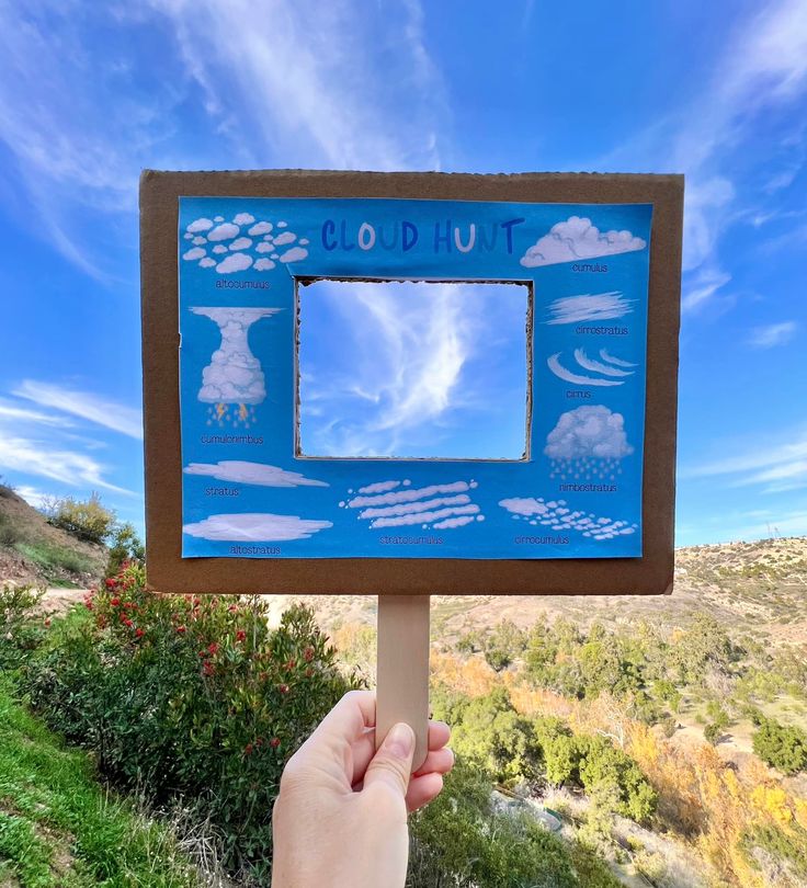 kid watching cloud with her cloud dectator
