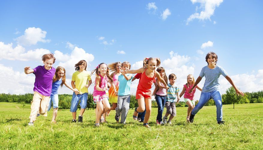 kids playing a freeze tag as one of the fun fall activities for kids