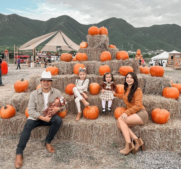 family taking photos in the patch