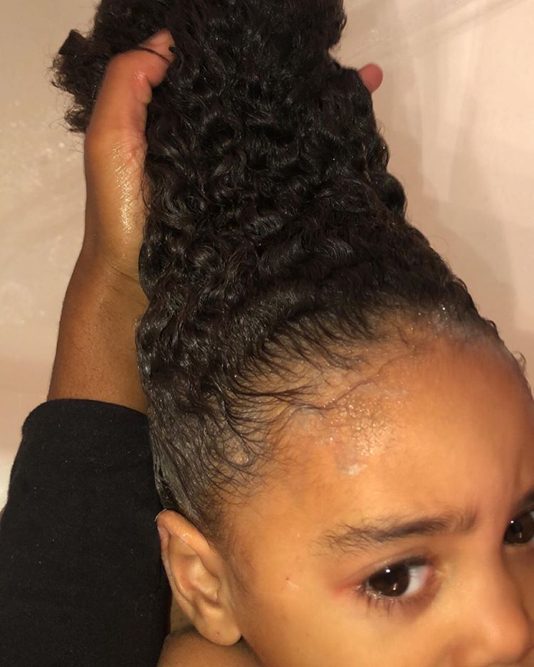 kid with moisturized hair