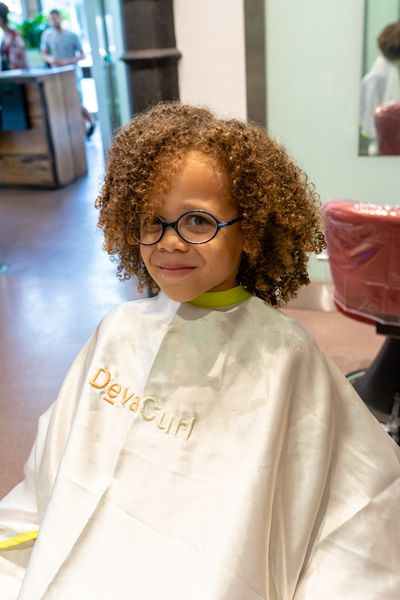 kid with curly hair