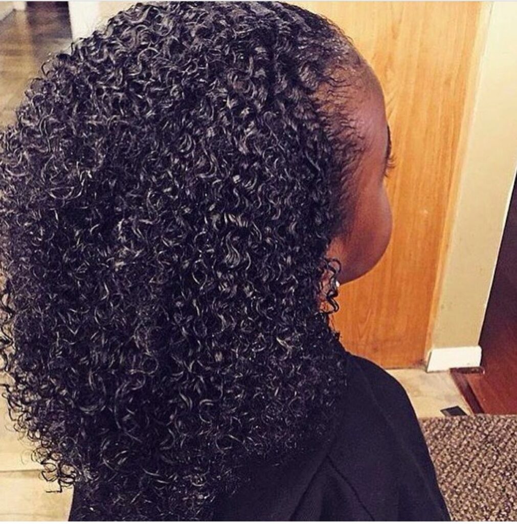 kid with a curly hair