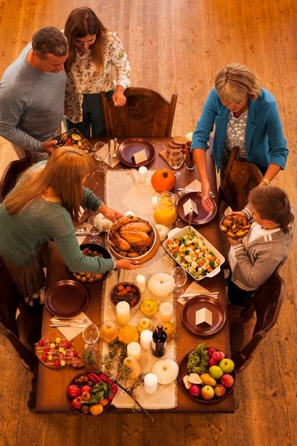 family celebrating fall