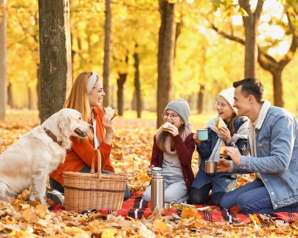 family celebrating fall