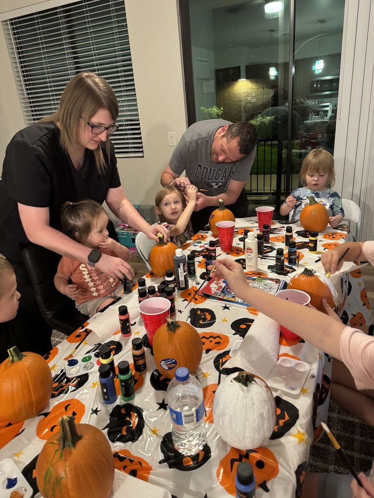 kids enjoying halloween party with their parents
