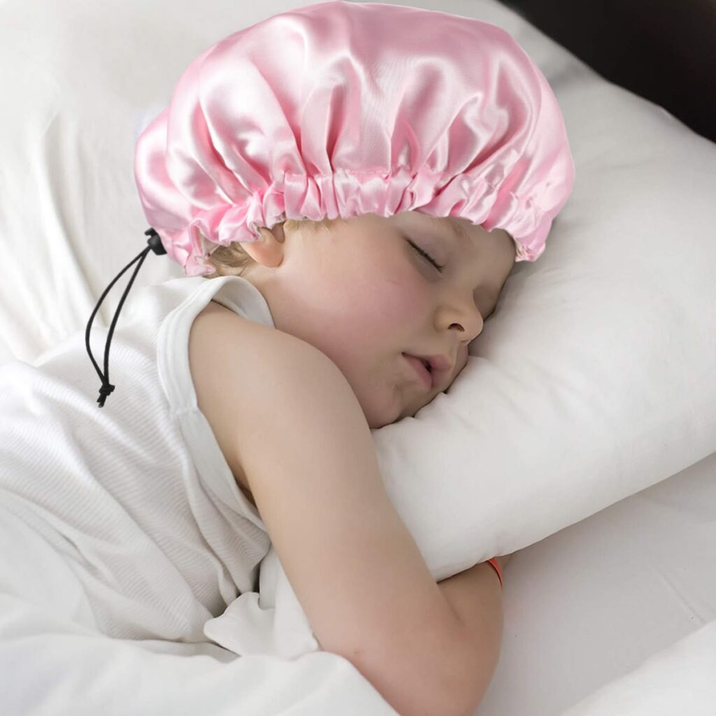 kid sleeping with hair bonnet
