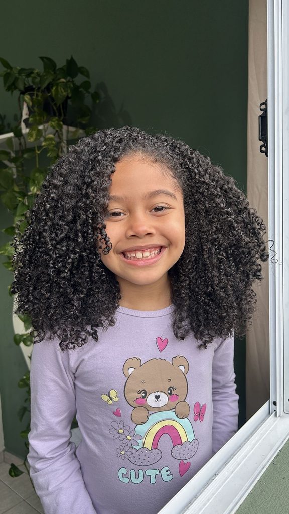 kid with curly full hair