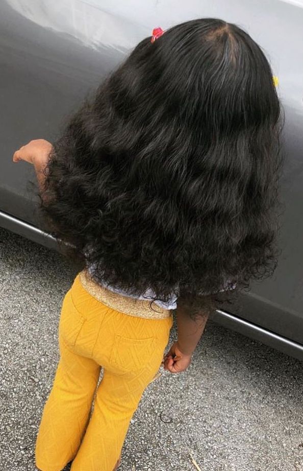 kid with long and moisturize hair