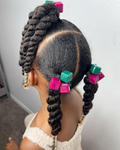 kid with protective hairstyle