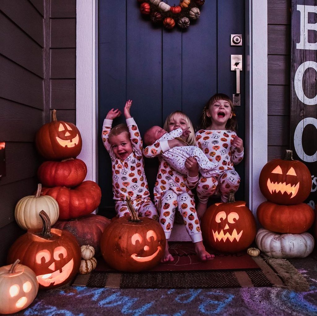 kids enjoying halloween at home as ways to make halloween less scary for kids