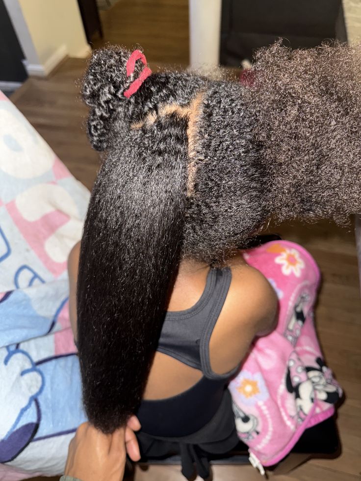 mom making kid's hair