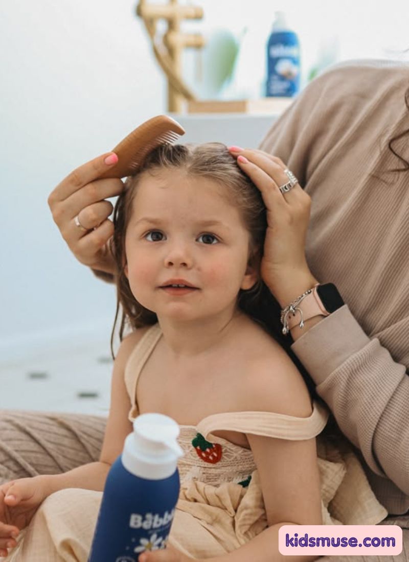 mom combing her child's hair