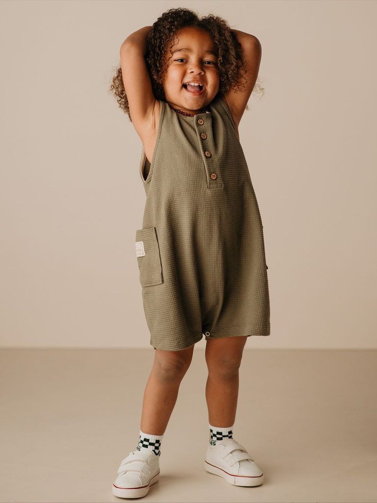 kid in athletic rompers as stylish outfit ideas for active kids