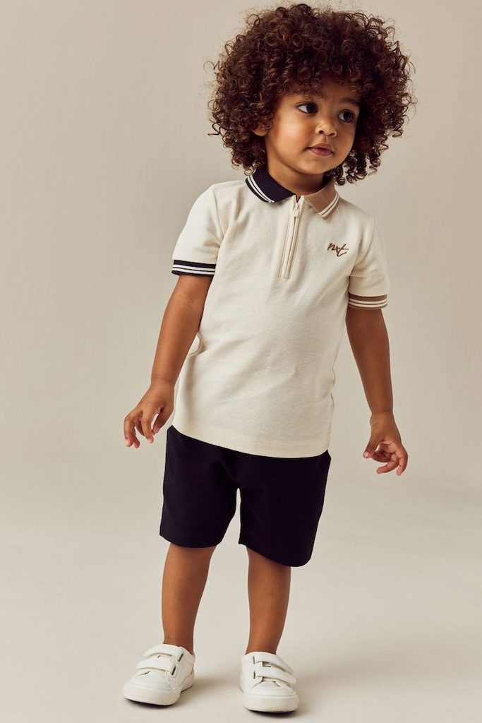 kid in basic polo shirts with pull on shorts