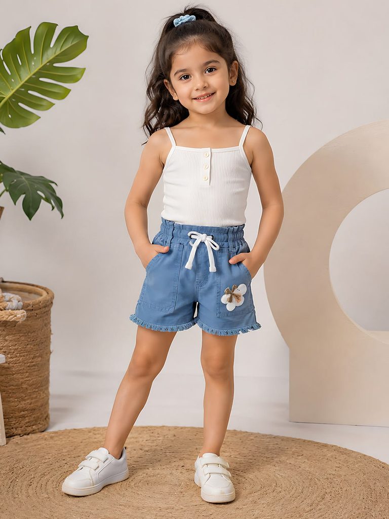 kid in basic ribbed tank with shorts