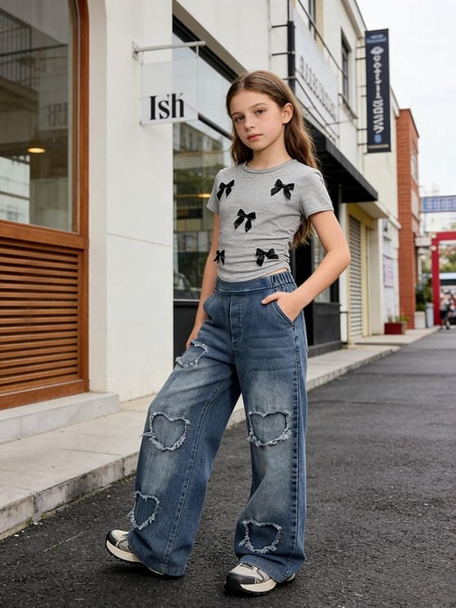 kid in boyfriend jeans with fitted top as jeans outfit ideas for little girls