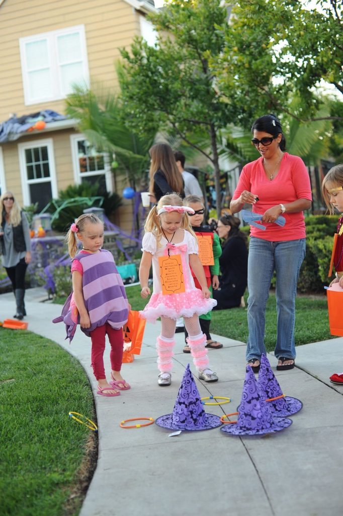 kids playing cauldron toss game