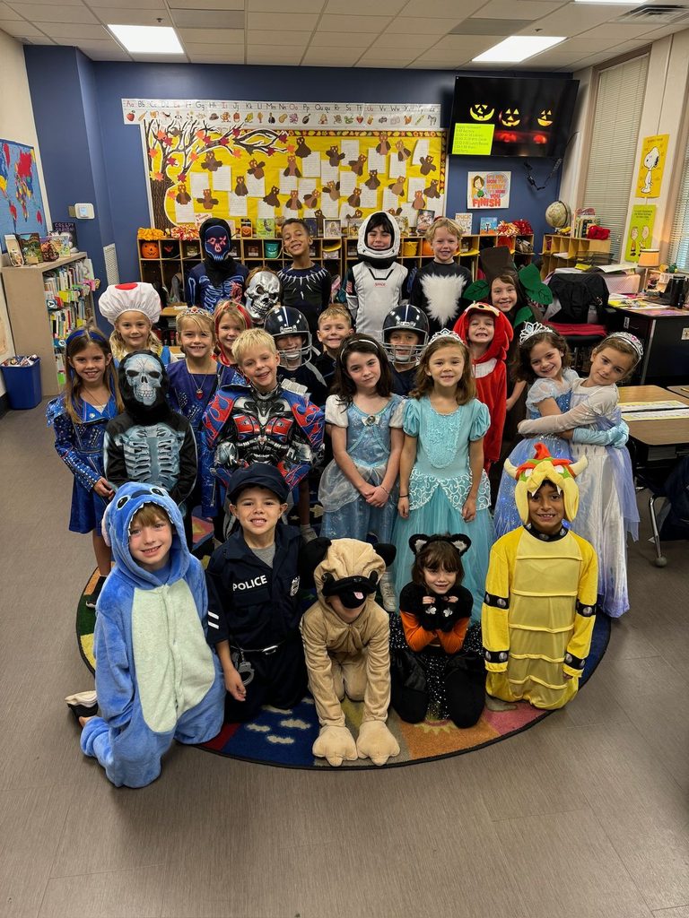 costume kids taking a group picture