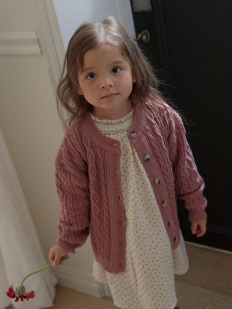 kid in classic cable knit cardigan