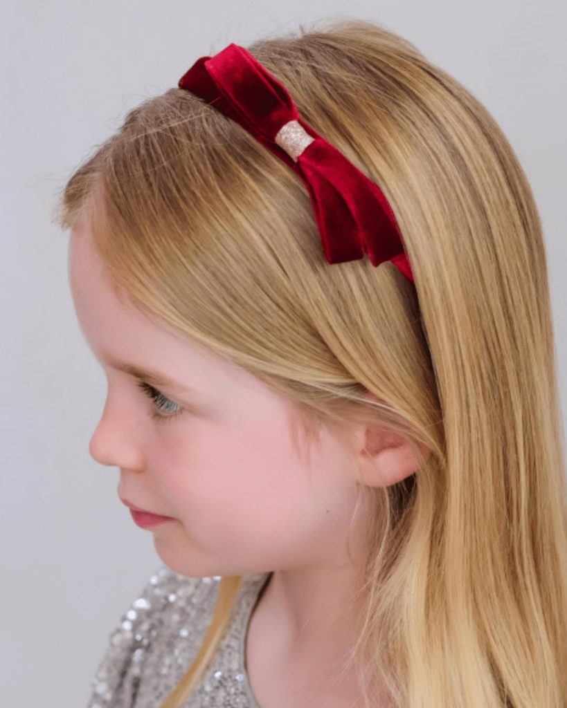 kid in velvet headband