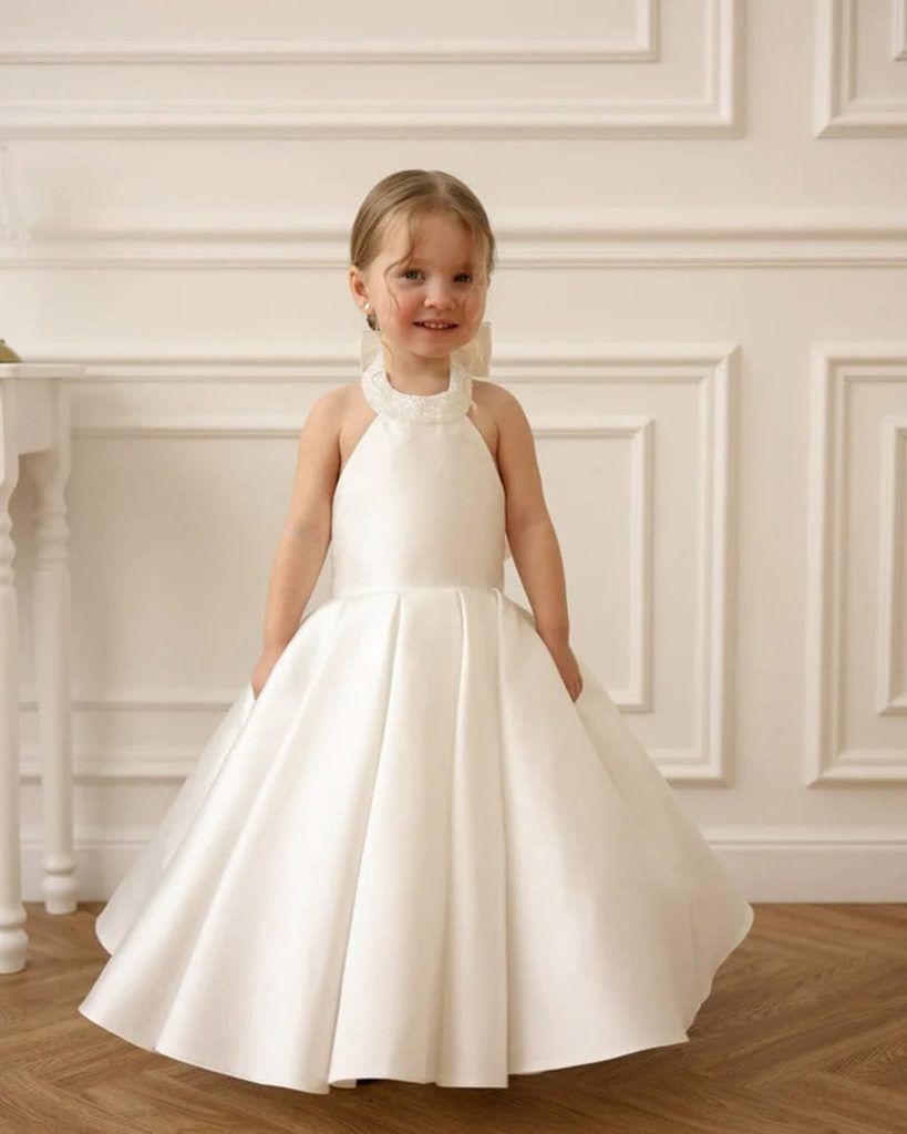 kid in Classic White Dress for Special Moments