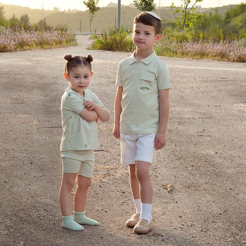 kids in matching polo shirts