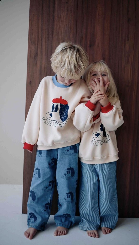 kids in matching sweater sets