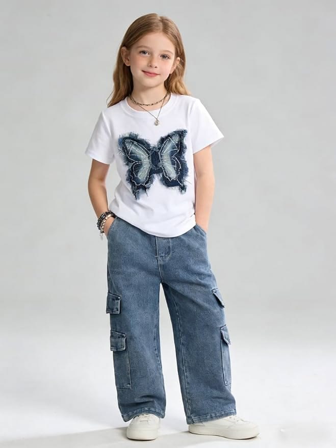 kid in denim joggers and graphic tee