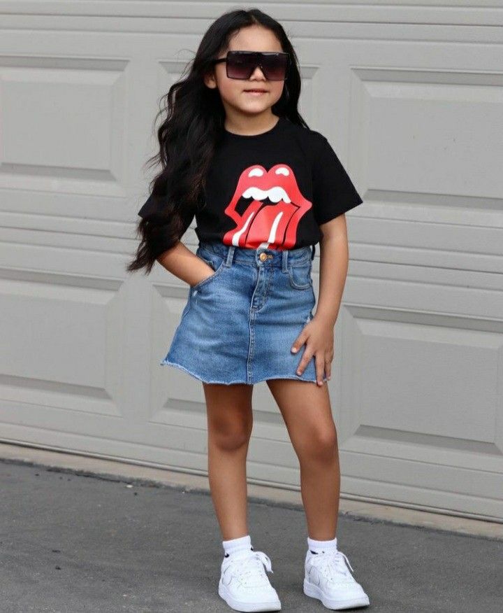 kid in denim skirt with a basic tee as casual outfit ideas for kids