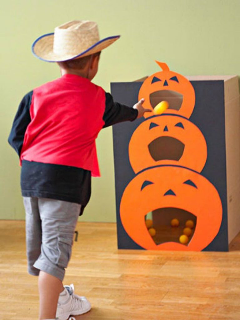 kid playing game as halloween activities for kids who don't like being scared