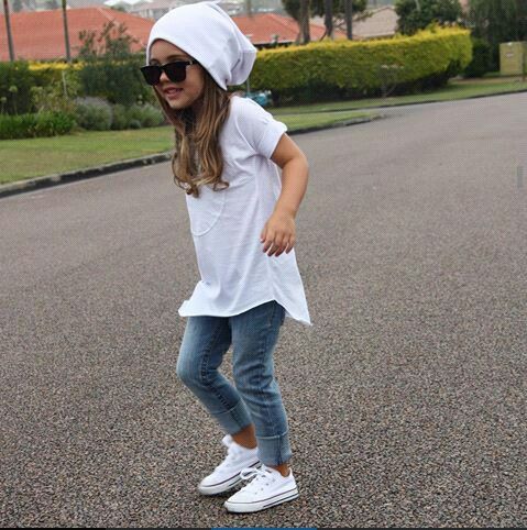 kid in Jean Leggings with an Oversized Tee