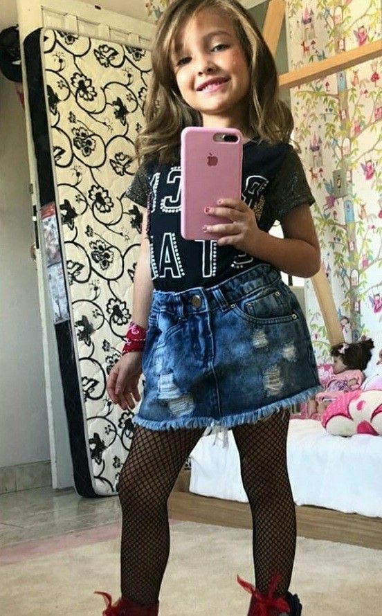 kid in Jean Skirt with Leggings Underneath