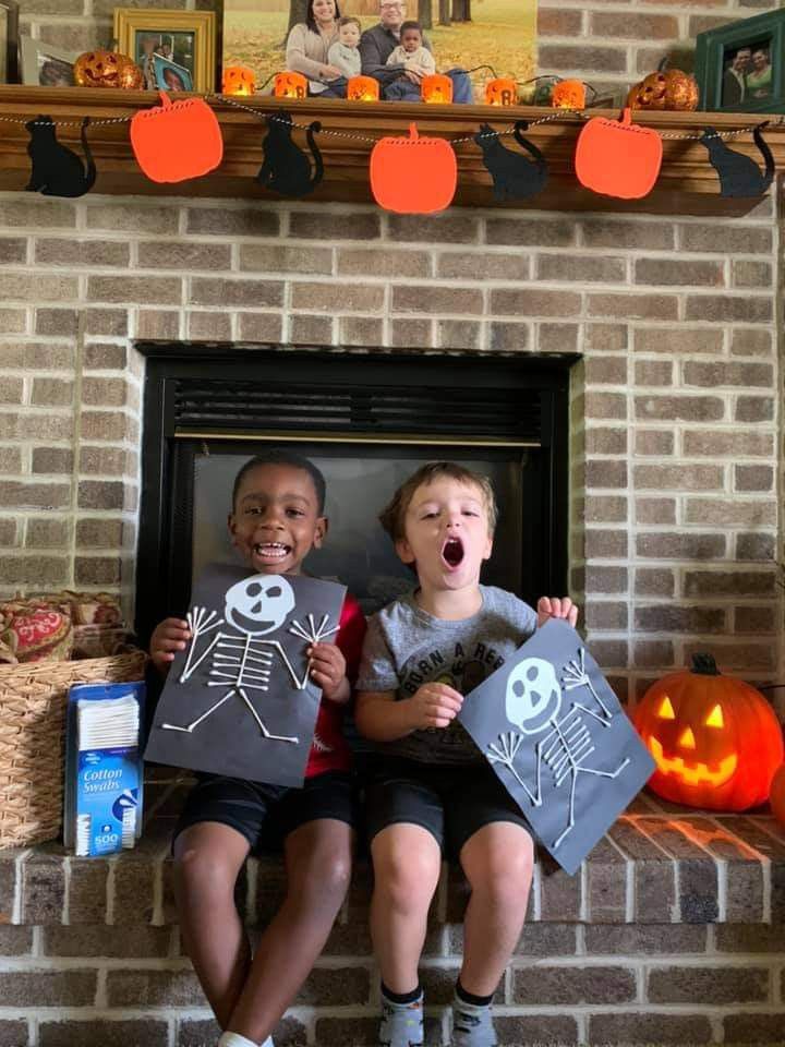 kids with halloween cards