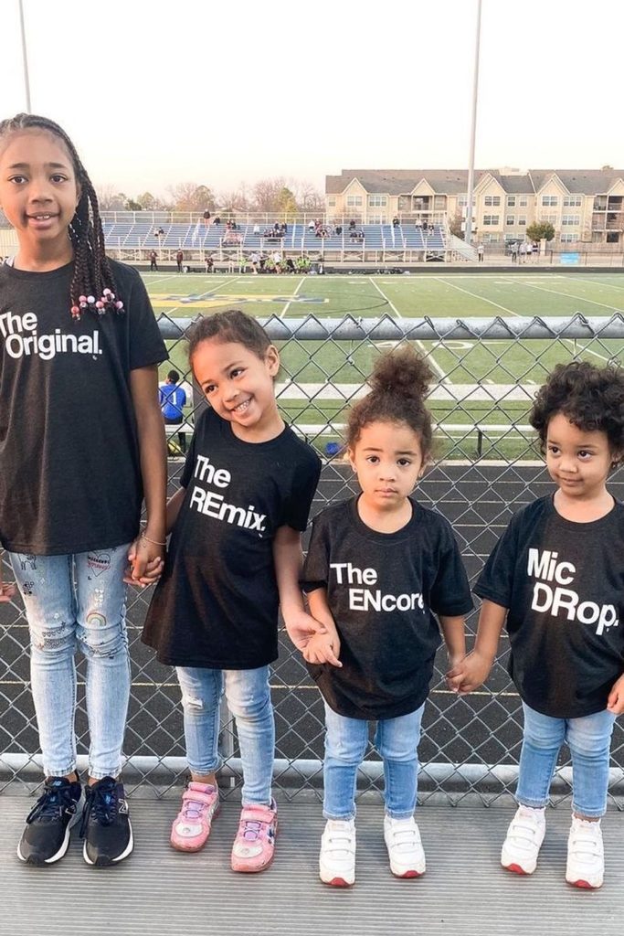kids in matching family themed graphic Tees