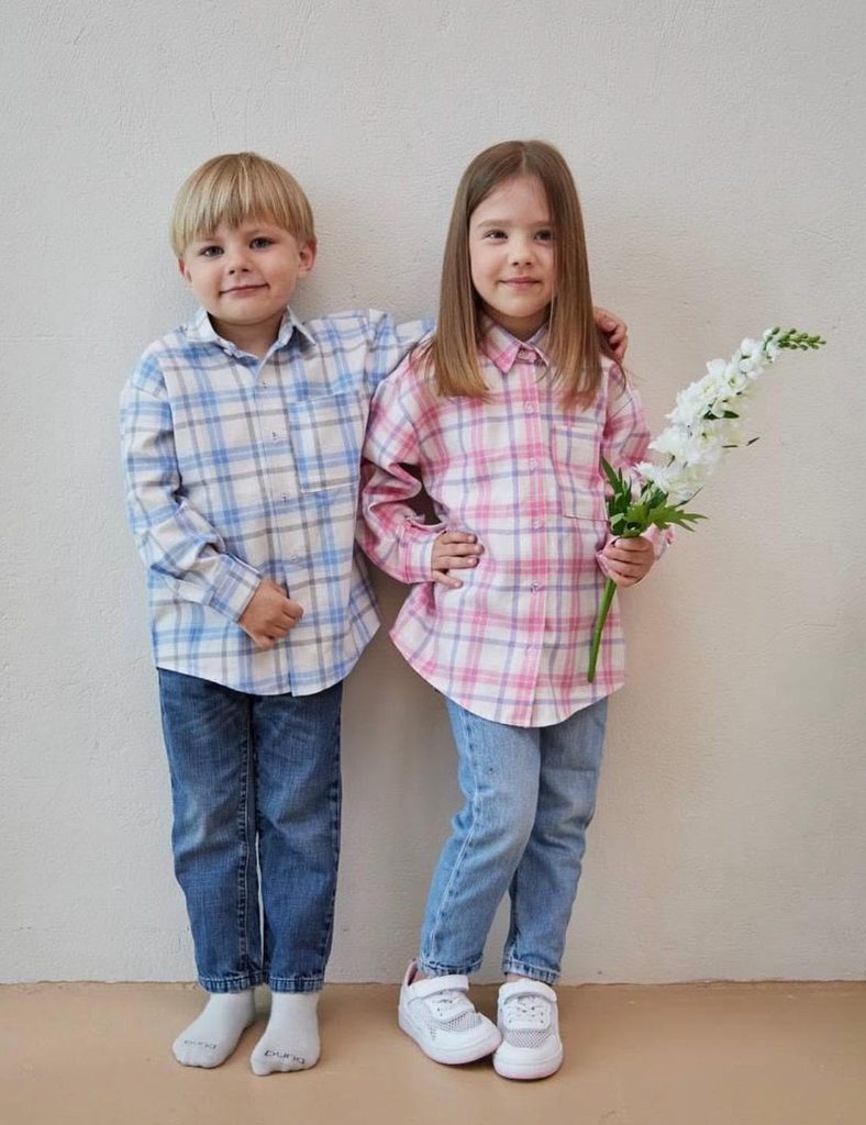 kids in matching flannel shirts
